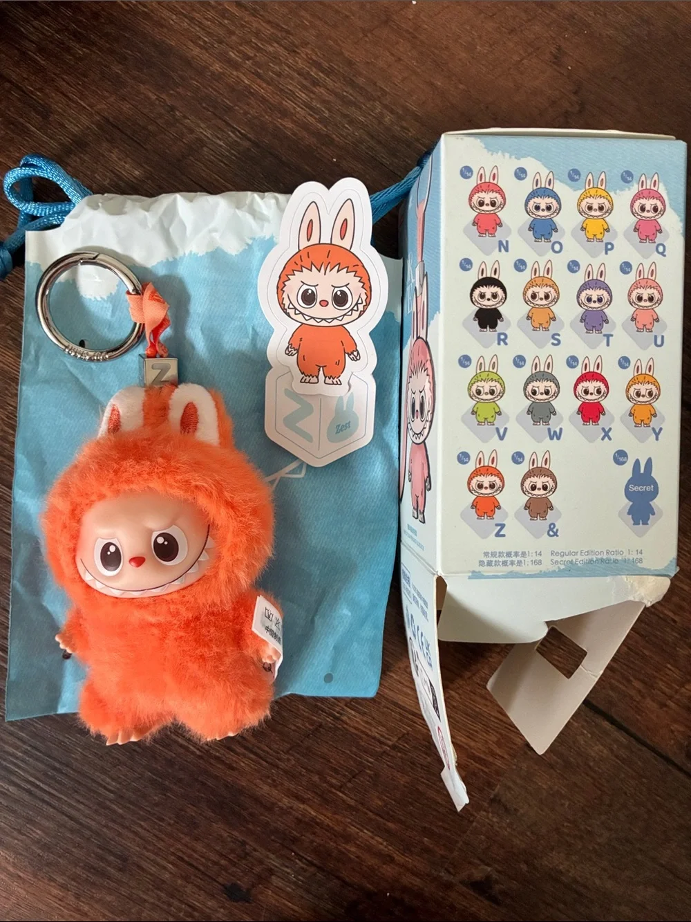 Popmart The Monsters Keychain and a unbranded capybara plush crossbody with pen